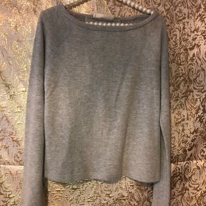 Open-back long sleeve top.